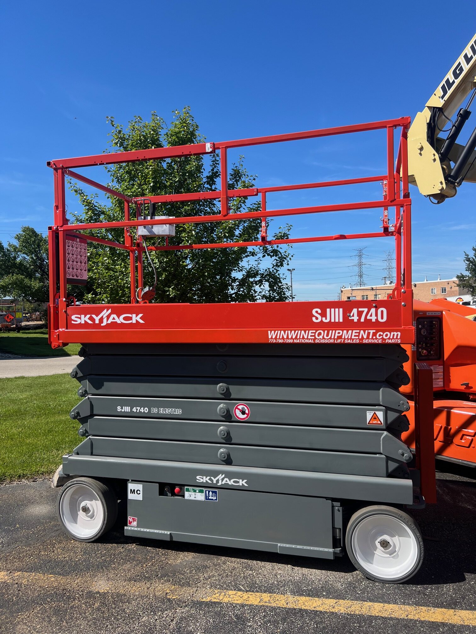 Refurbished 40 ft Skyjack and Genie scissor lifts for sale — Win Win Equipment Addison IL