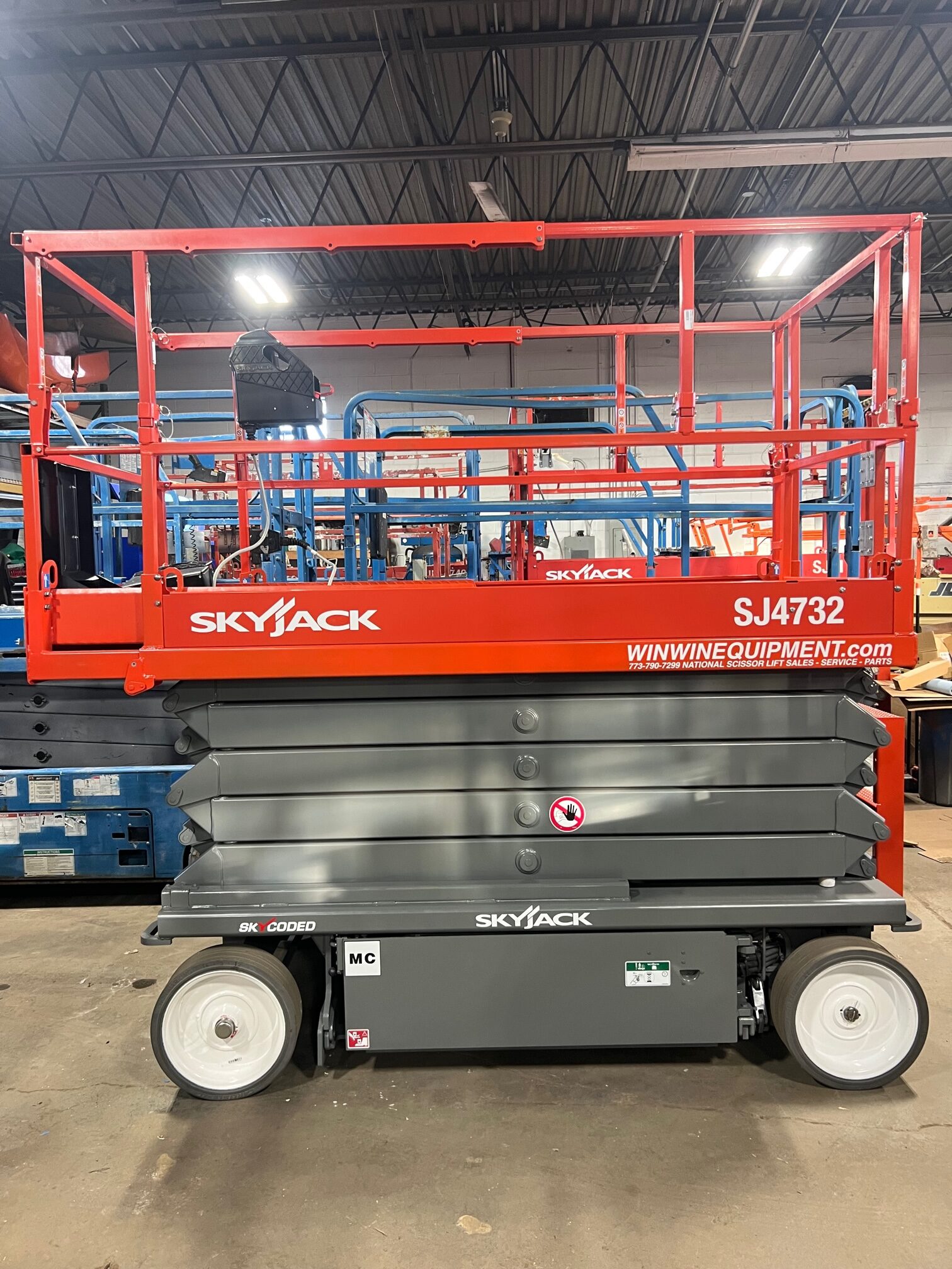 Refurbished 32 ft Skyjack and Genie scissor lifts for sale — Win Win Equipment Addison IL