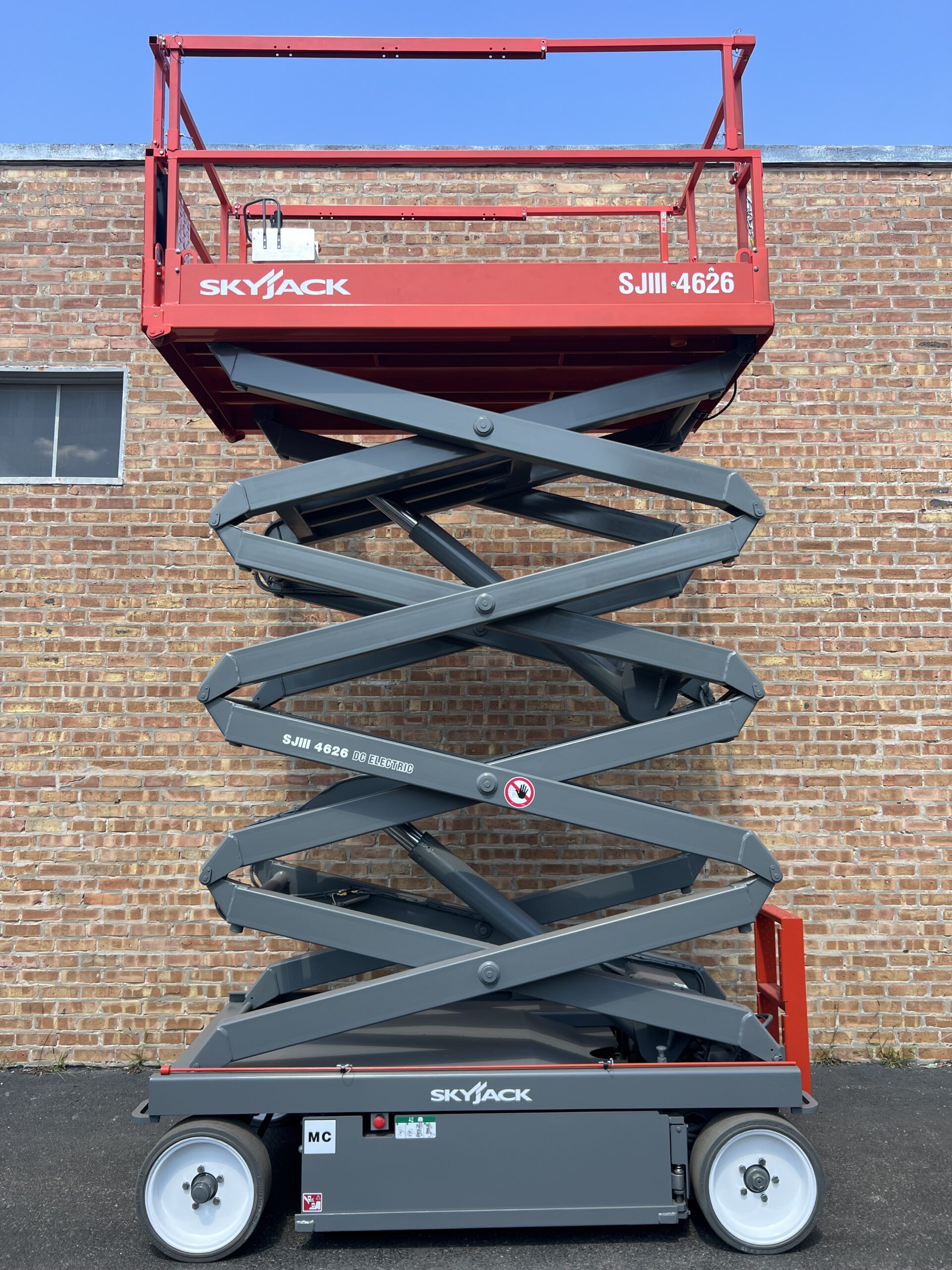 Refurbished 26 ft Skyjack and Genie scissor lifts for sale — Win Win Equipment Addison IL