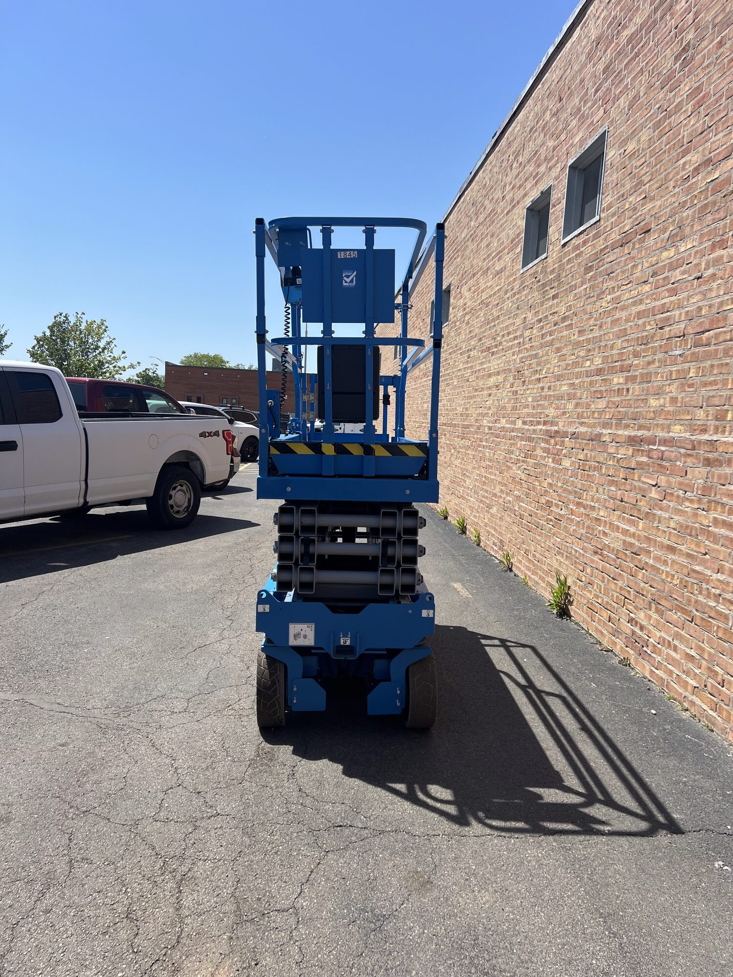 Refurbished Genie scissor lift for sale in Georgia, rebuilt and repainted