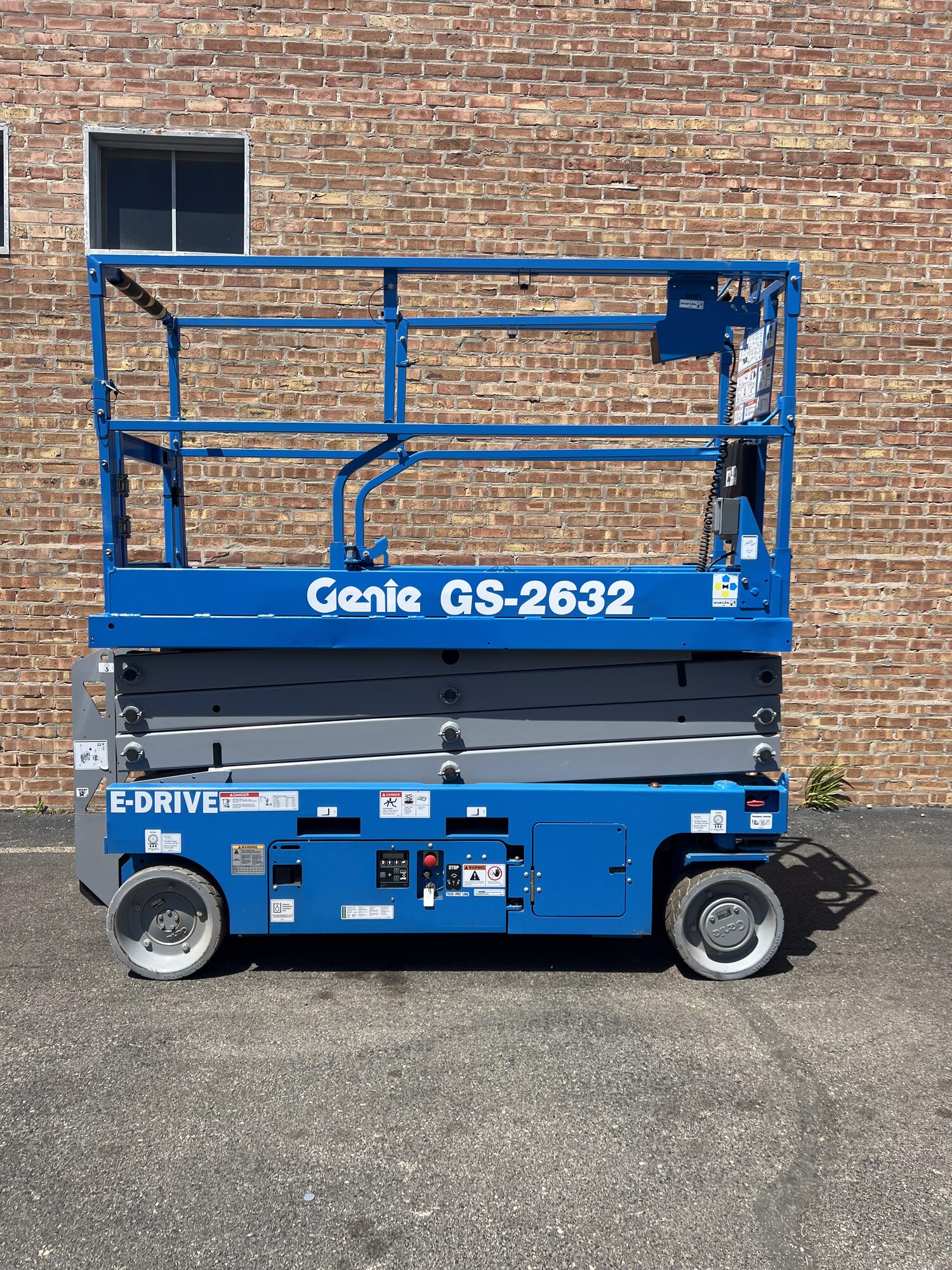 Refurbished Genie scissor lift for sale in Iowa, rebuilt and repainted