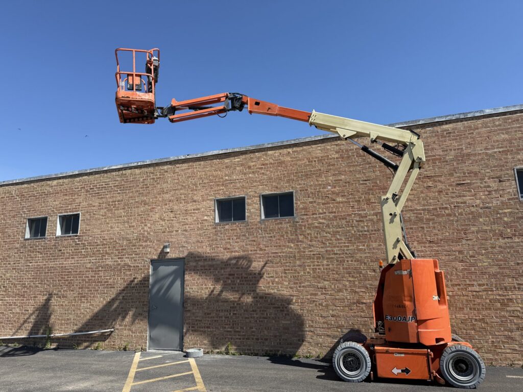2015 JLG E300 AJP electric articulating boom lift with boom extended